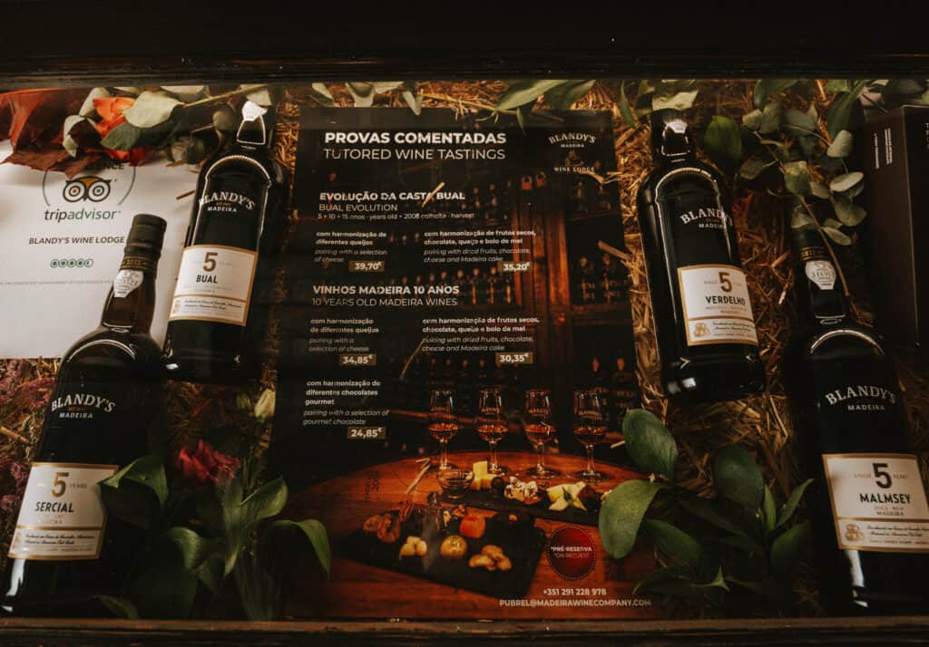 the display case inside Blandy's Wine Lodge, a famous Madeira winery