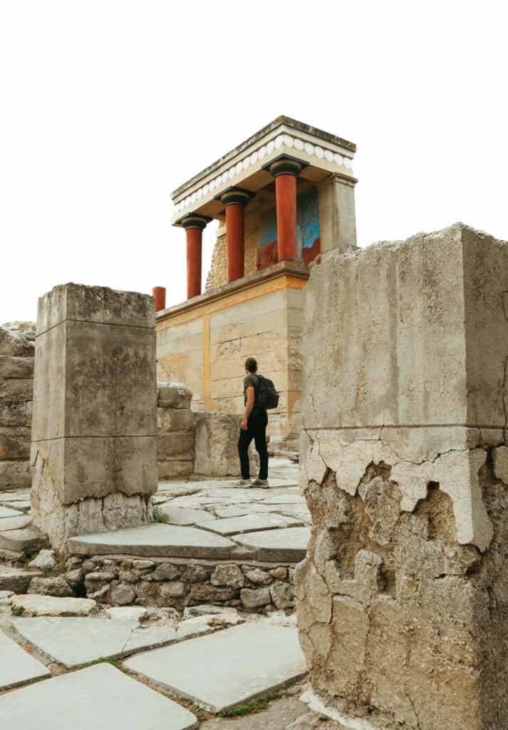 Caleb standing beneath the main attraction at Knossos Palace in Heraklion, Crete, Greece
