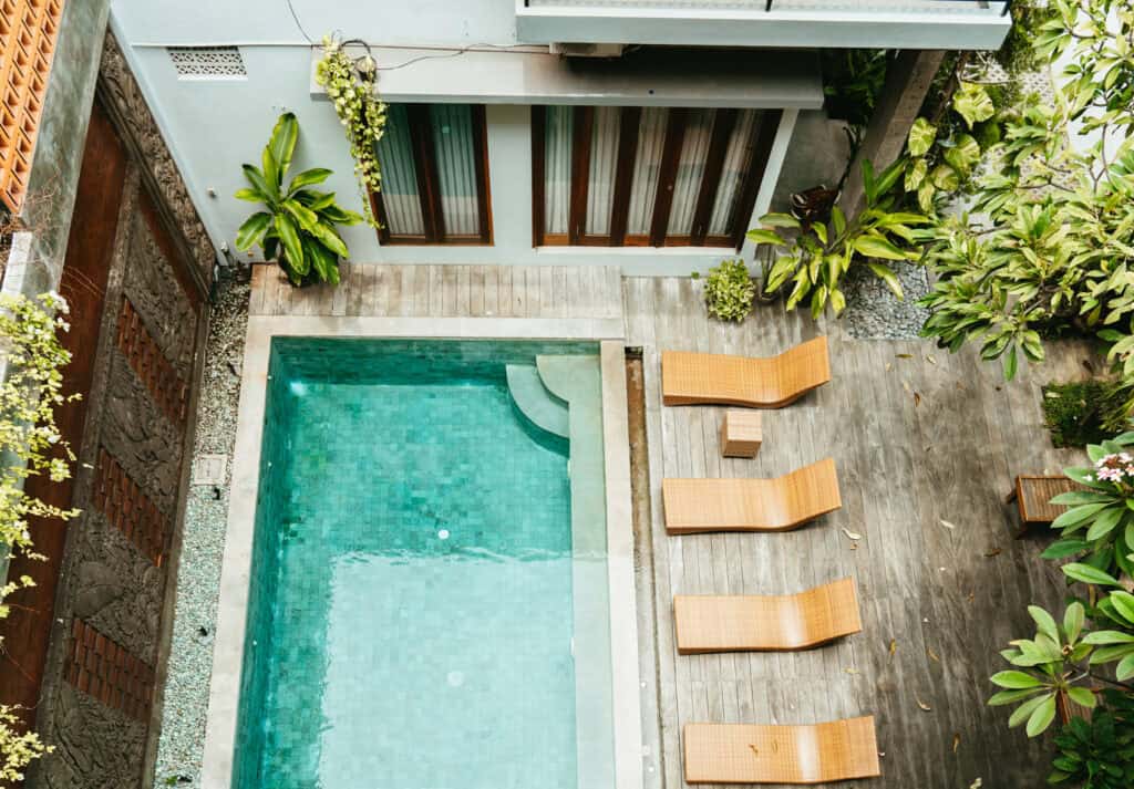 looking down at a beautiful hotel plunge pool in Canggu, Bali
