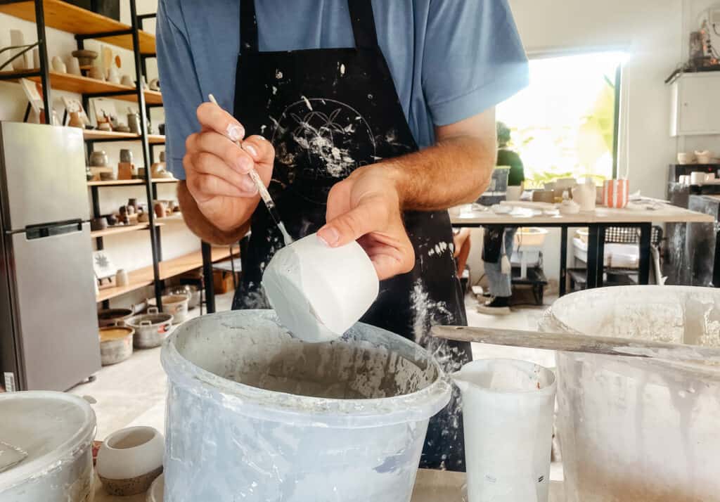 Caleb working on a ceramics project at a pottery calls in Canggu