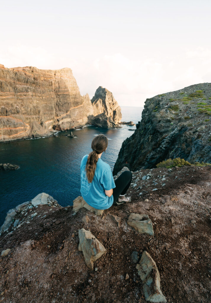 Sarah looking down at the ocean from the hike of Sao Lourenco in Madeira, Portugal