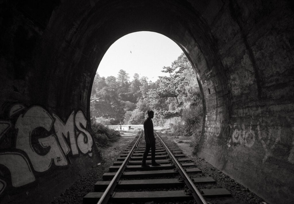 Caleb standing in the tunnel at Nine Arches Bridge in Sri Lanka